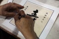 Chinese calligraphy master is writing Longlife