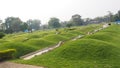 Chinese cemetery, mound and slope grass graves of chinese graveyard Royalty Free Stock Photo