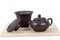 Chinese ceramic tea set bamboo mat isolated on white Royalty Free Stock Photo