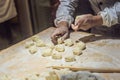 Chinese chef making dumplings in the kitchen Royalty Free Stock Photo