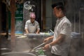 Chinese chef preparing hot food Royalty Free Stock Photo