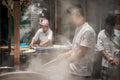 Chinese chef preparing hot food Royalty Free Stock Photo