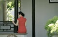 Chinese cheongsam model in Chinese classical garden