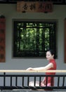 Chinese cheongsam model in Chinese classical garden