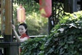 Chinese cheongsam model in Chinese classical garden