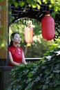 Chinese cheongsam model in Chinese classical garden