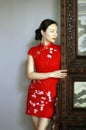 Chinese cheongsam model in Chinese classical garden Royalty Free Stock Photo