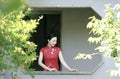 Chinese cheongsam model in Chinese classical garden Royalty Free Stock Photo