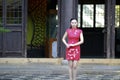 Chinese cheongsam model gesturing