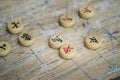 Chinese chess pieces made of wood on chessboard Royalty Free Stock Photo