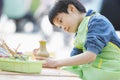 chinese child dedicated makes handwork