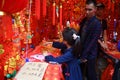 A Chinese child is visiting the new year market