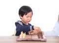 Chinese children learn chess under the guidance of teachers