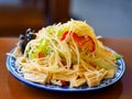 A Chinese cold dish of shredded potato salad, yuba / tofu skin, and green peppers