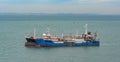 Chinese commercial trawlers anchored on the outer anchorage. Royalty Free Stock Photo