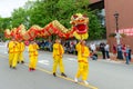 The Chinese community performs the Dragon Dance