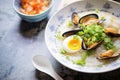 chinese congee with century eggs and scallions Royalty Free Stock Photo