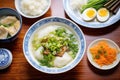 chinese congee with century eggs and scallions Royalty Free Stock Photo