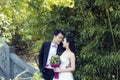 A Chinese couple`s wedding photo who stand on a stone ancient bridge in shui bo park in Shanghai Royalty Free Stock Photo