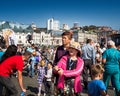 Chinese couple take a selfie in front of the annual Tiger Day carnival in Vladivostok