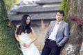 Chinese couple wedding portraint in front of Old trees and old building Royalty Free Stock Photo