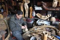 Chinese craftsman making traditional souvenirs