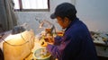 Chinese craftsman working with jade