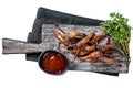 Chinese cuisine Spicy Dip fried duck tongue. Isolated, white background. Royalty Free Stock Photo