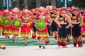 Chinese dancing people in Zhuang ethnic Festival