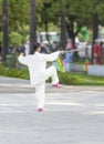 Chinese deals in the Park exercise with a sword.