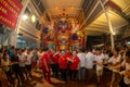 Chinese devotees pull the statue of ghost king and sent to burn.