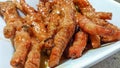 Chinese dim sum style braised or steamed chicken feet in black bean sauce Royalty Free Stock Photo