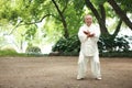 Chinese do taichi outside Royalty Free Stock Photo