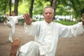 Chinese do taichi outside Royalty Free Stock Photo