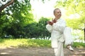 Chinese do taichi outside