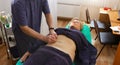 Chinese doctor doing acupuncture on stomach Royalty Free Stock Photo