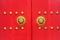 Chinese door with a lion hand door Royalty Free Stock Photo