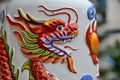 Chinese dragon breathes fire on ceramic art at temple Hat Yai Thailand Royalty Free Stock Photo