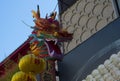 Chinese dragon on display in Chinatown with yellow lanterns Yokohama, Japan