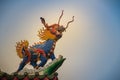 Chinese dragon-headed unicorn statue on the temple roof. Kylin o Royalty Free Stock Photo