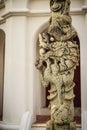 Chinese dragon pillar stone carving column outside in Thai temple. Traditional stone dragon column decoration in the Buddhist Royalty Free Stock Photo