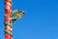 Chinese Dragon on Red Pillar on Blue Background, Processed in Pa Royalty Free Stock Photo