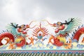 Chinese dragon statue on the roof with sky background Royalty Free Stock Photo
