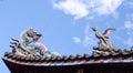 Chinese Dragon and Swan statue in the corner roof with blue sky Royalty Free Stock Photo