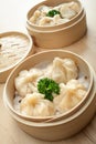 Chinese dumpling in a bamboo steamer box Royalty Free Stock Photo