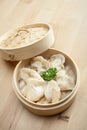 Chinese dumpling in a bamboo steamer box Royalty Free Stock Photo
