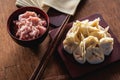 Chinese dumpling on wooden background