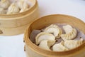 Chinese dumplings in bamboo steamer. Dumplings are among the mos