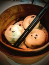 Chinese dumplings or Dim Sum on a wooden offering a taste of authenticity and culinary charm. Royalty Free Stock Photo