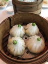 Authentic Chinese dumplings or Dim Sum on a wooden basket, Asia traditional food Royalty Free Stock Photo